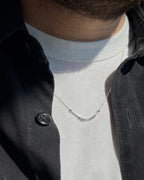 Morsekodshalsband i silver, buret till skjorta